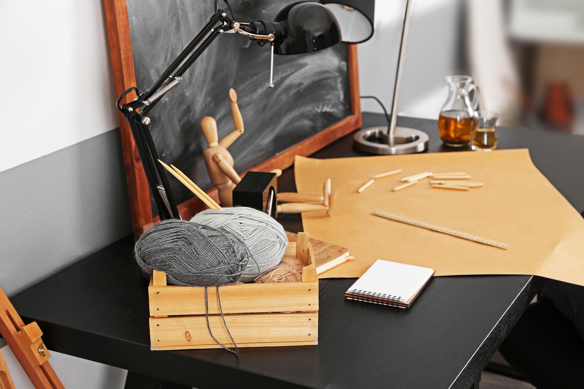 Workshop bench with threads and sketches